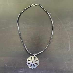 Handmade carved shell necklace